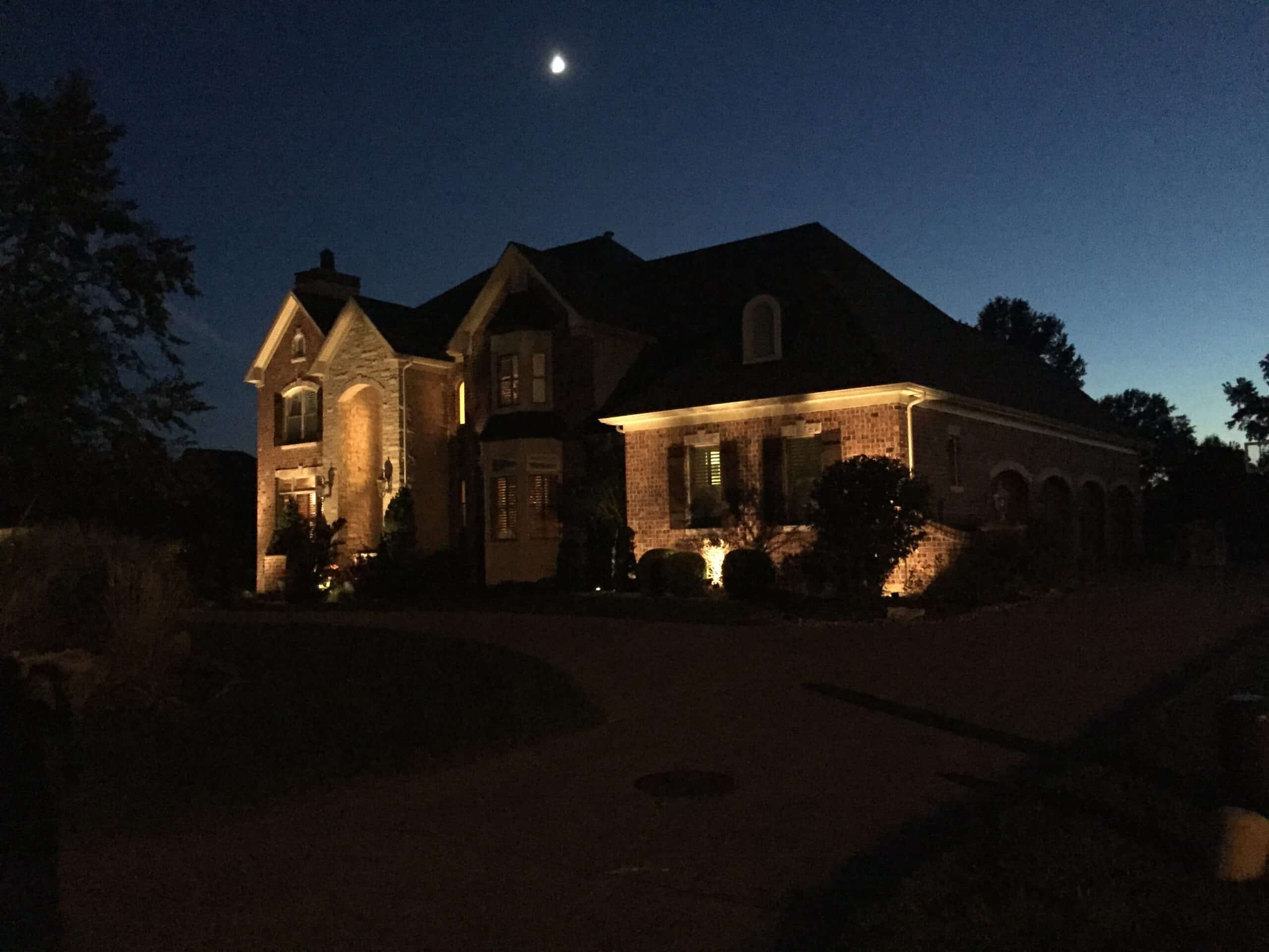 House with Exterior Lighting and Driveway